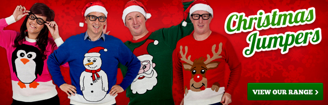 Geeky models wearing colourful Christmas jumpers